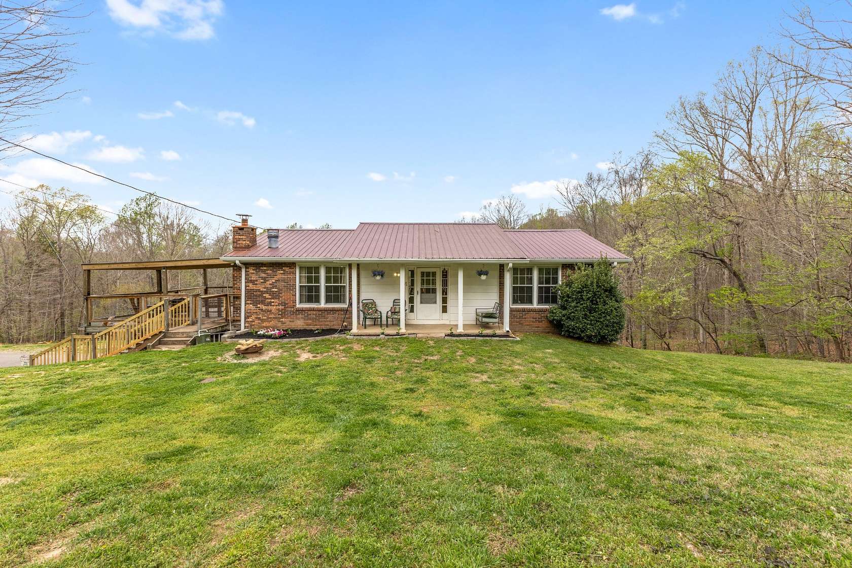 7.37 Acres of Land with Home for Sale in Vanleer, Tennessee