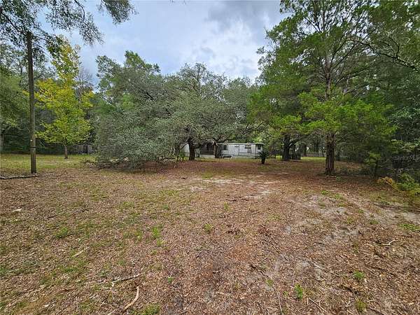 2.5 Acres of Land with Home for Sale in Bronson, Florida