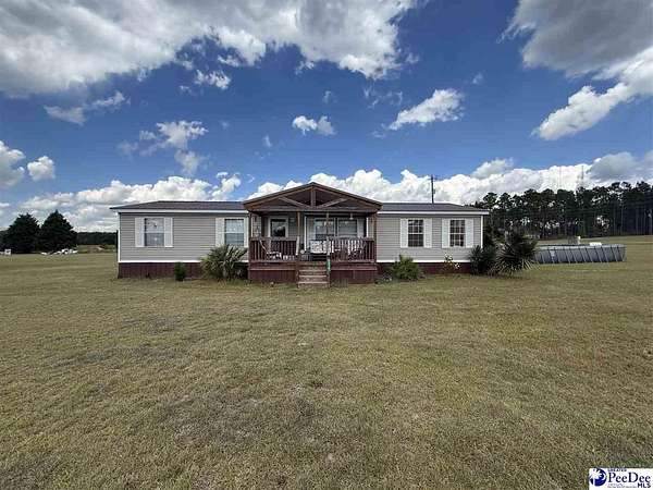2.57 Acres of Land with Home for Sale in Mount Croghan, South Carolina