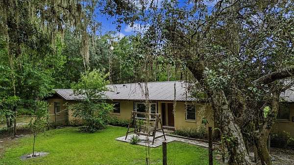 4.23 Acres of Land with Home for Sale in Silver Springs, Florida