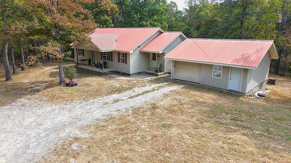 7 Acres of Land with Home for Sale in Melbourne, Arkansas