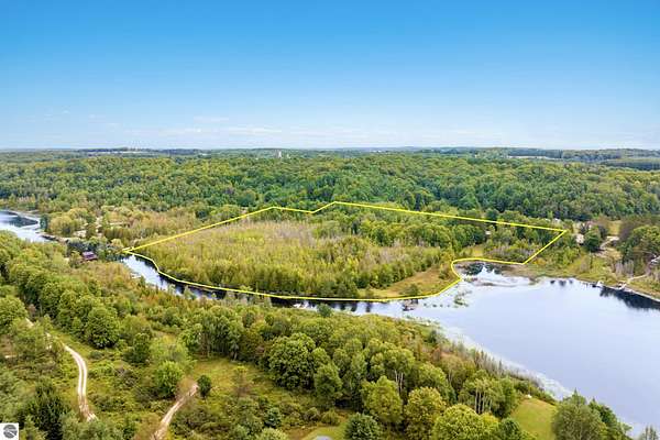 22.7 Acres of Recreational Land with Home for Sale in Ellsworth, Michigan
