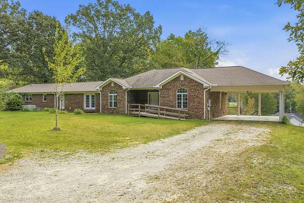 8.8 Acres of Land with Home for Sale in Parsons, Tennessee