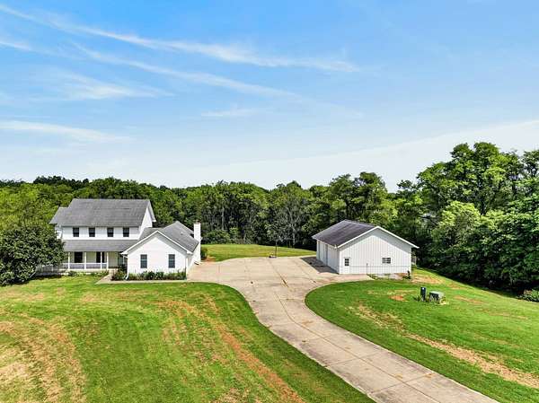 9.83 Acres of Land with Home for Sale in Sunman, Indiana