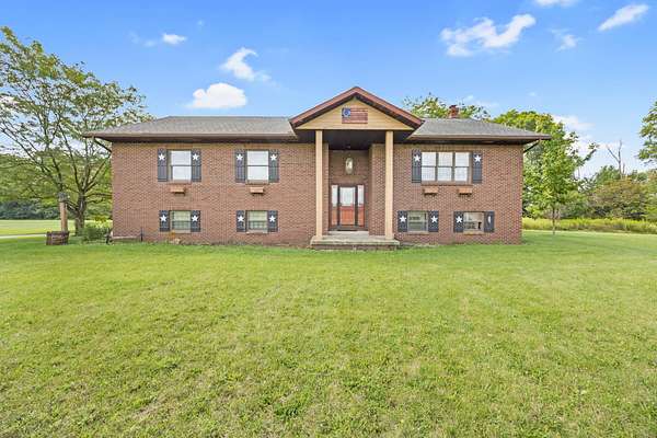 5.36 Acres of Land with Home for Sale in Lewistown, Ohio