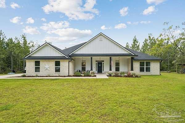 6.1 Acres of Land with Home for Sale in Pace, Florida