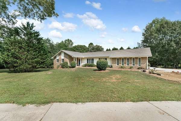 9.59 Acres of Land with Home for Sale in Cumming, Georgia