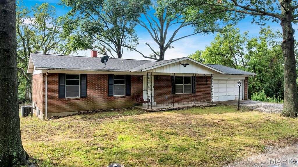9.73 Acres of Land with Home for Sale in Columbia, Illinois