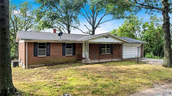 9.73 Acres of Land with Home for Sale in Columbia, Illinois