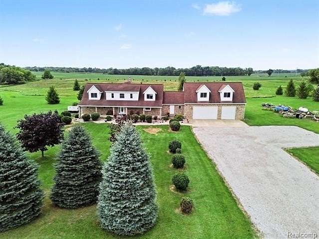 10 Acres of Land with Home for Sale in Iosco Township, Michigan