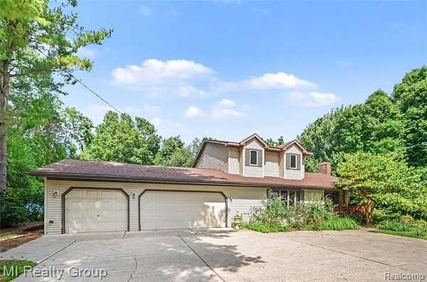 1.72 Acres of Land with Home for Sale in Washington Township, Michigan