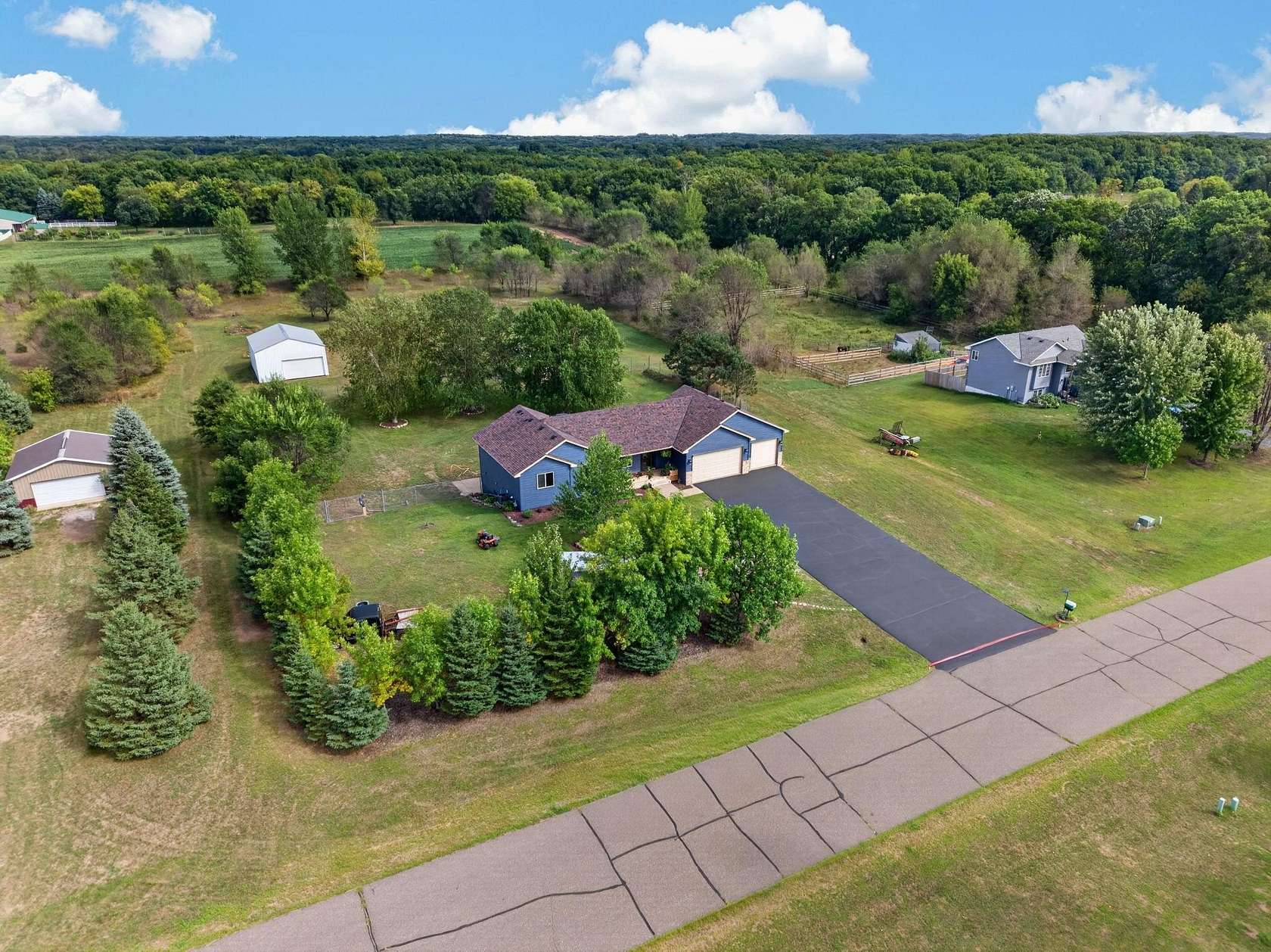 2.5 Acres of Land with Home for Sale in Zimmerman, Minnesota