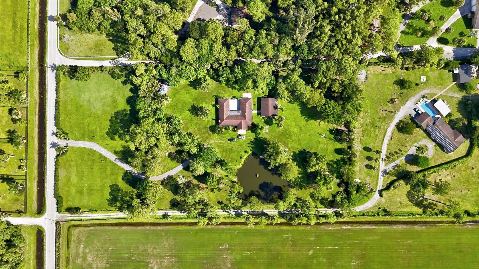 4.7 Acres of Land with Home for Sale in Loxahatchee Groves, Florida