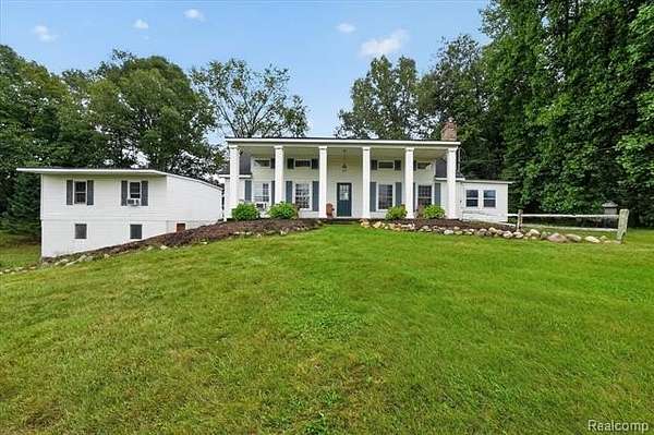 9.15 Acres of Land with Home for Sale in Oxford, Michigan