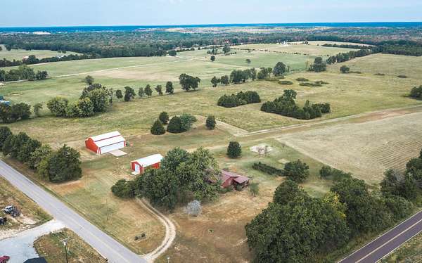 58 Acres of Land with Home for Sale in Licking, Missouri