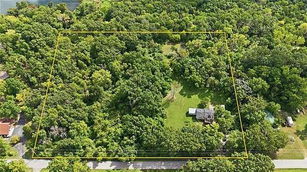 4.69 Acres of Land with Home for Sale in Grain Valley, Missouri