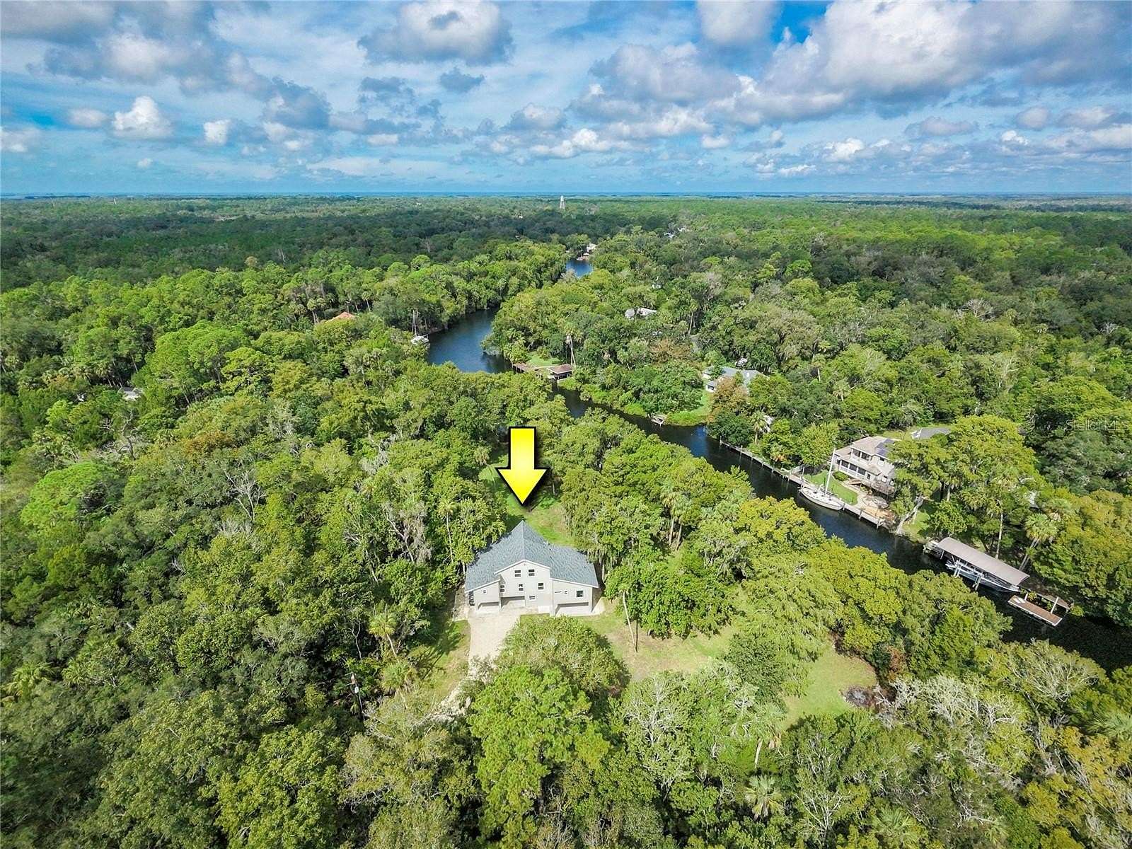 4.36 Acres of Land with Home for Sale in Inglis, Florida