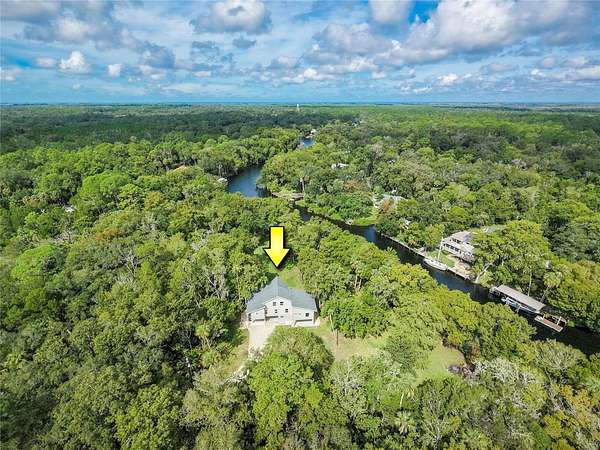 4.36 Acres of Land with Home for Sale in Inglis, Florida