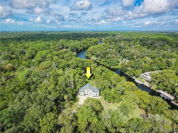 4.36 Acres of Land with Home for Sale in Inglis, Florida
