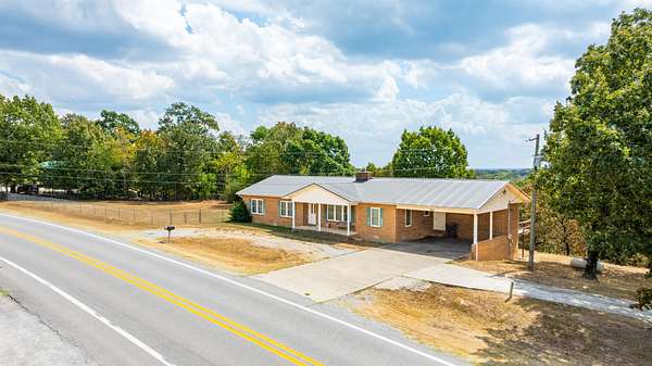 8.4 Acres of Land with Home for Sale in Cave City, Arkansas
