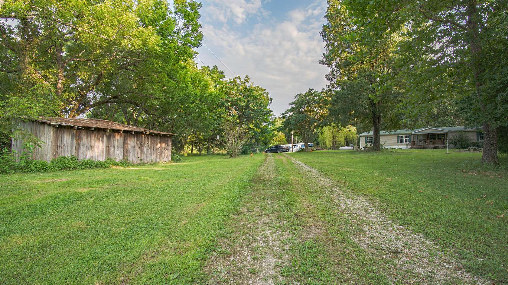 20.8 Acres of Agricultural Land with Home for Sale in Drury, Missouri