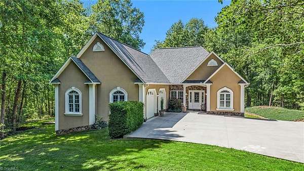 6 Acres of Land with Home for Sale in Millers Creek, North Carolina