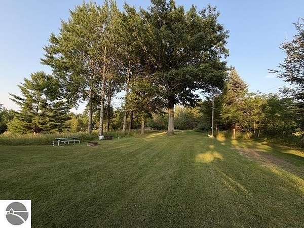11.6 Acres of Recreational Land with Home for Sale in Hale, Michigan
