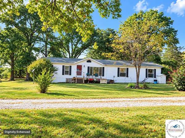 10 Acres of Land with Home for Sale in Stockton, Missouri