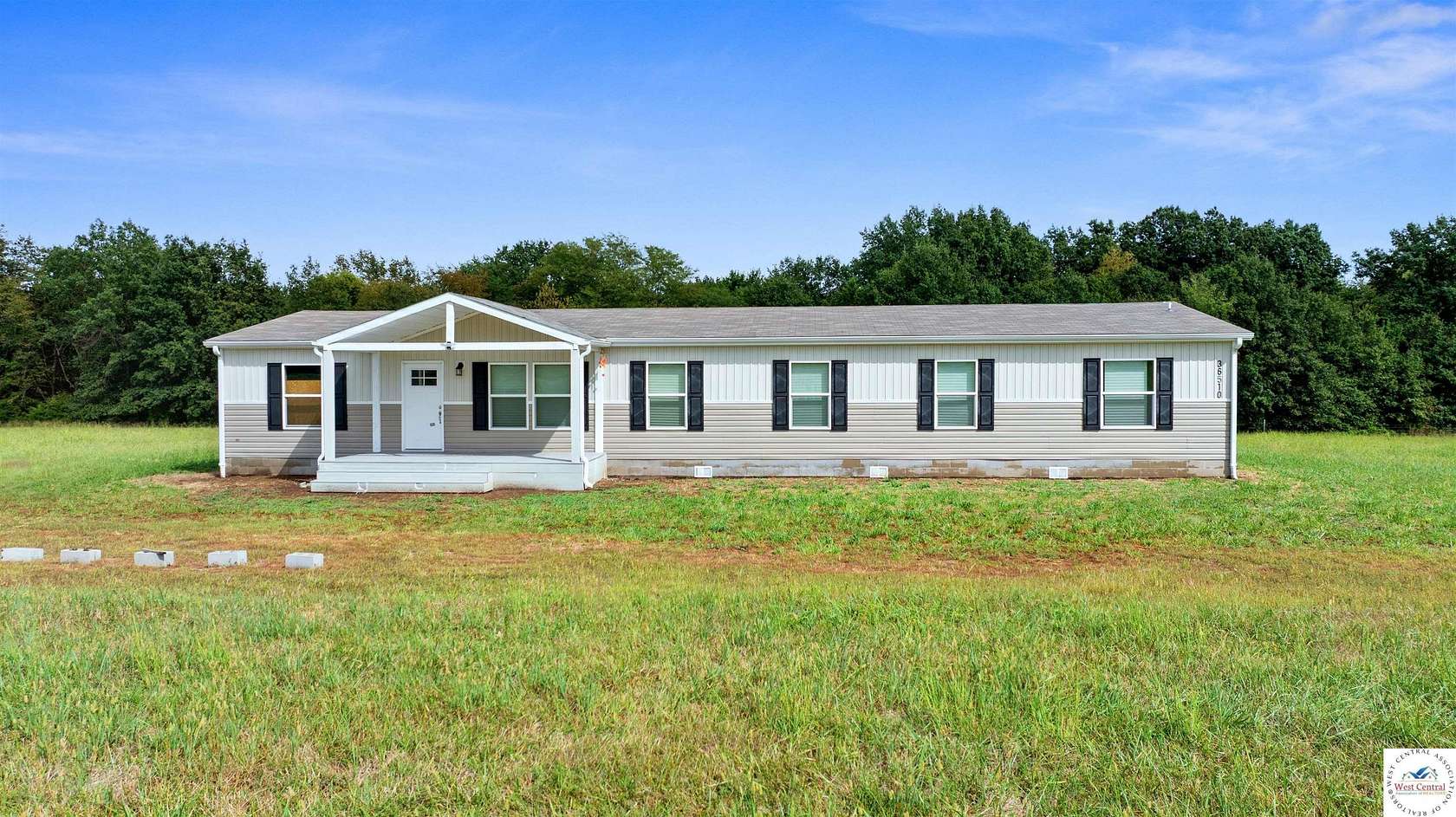 10 Acres of Land with Home for Sale in Green Ridge, Missouri