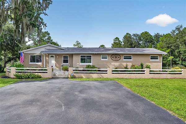2.36 Acres of Land with Home for Sale in Christmas, Florida