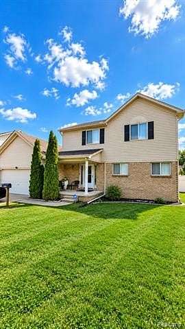 1.53 Acres of Land with Home for Sale in Fraser, Michigan