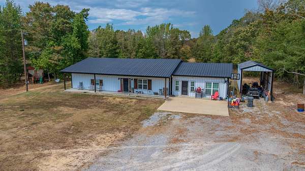 13.1 Acres of Land with Home for Sale in Charlotte, Arkansas