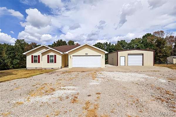 3.89 Acres of Land with Home for Sale in Lebanon, Missouri