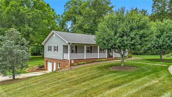 1.5 Acres of Land with Home for Sale in Millers Creek, North Carolina