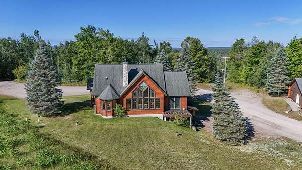 11 Acres of Improved Commercial Land for Sale in Wolverine, Michigan