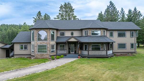6.23 Acres of Land with Home for Sale in Kalispell, Montana