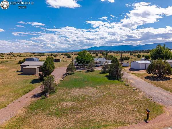 7.79 Acres of Land with Home for Sale in Florence, Colorado