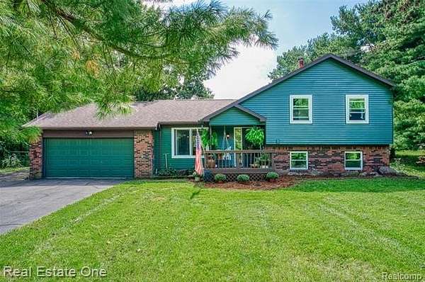 2.1 Acres of Land with Home for Sale in White Oak Township, Michigan