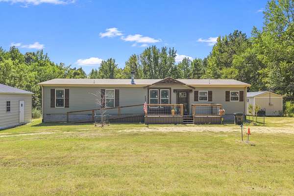 35.8 Acres of Recreational Land with Home for Sale in Cedar Grove, Tennessee