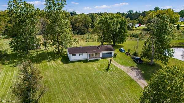 11.1 Acres of Land with Home for Sale in Zanesville, Ohio