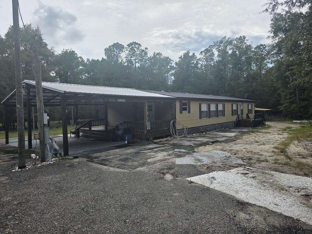 10 Acres of Recreational Land with Home for Sale in Branford, Florida