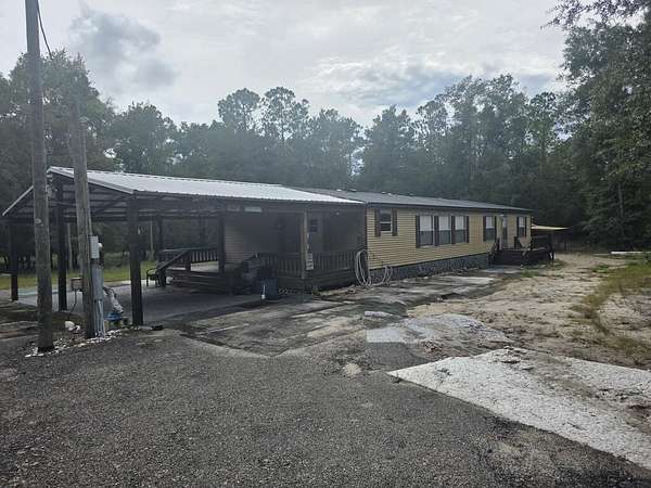 10 Acres of Recreational Land with Home for Sale in Branford, Florida