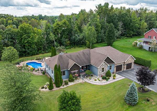 4.7 Acres of Land with Home for Sale in Morrisonville, New York