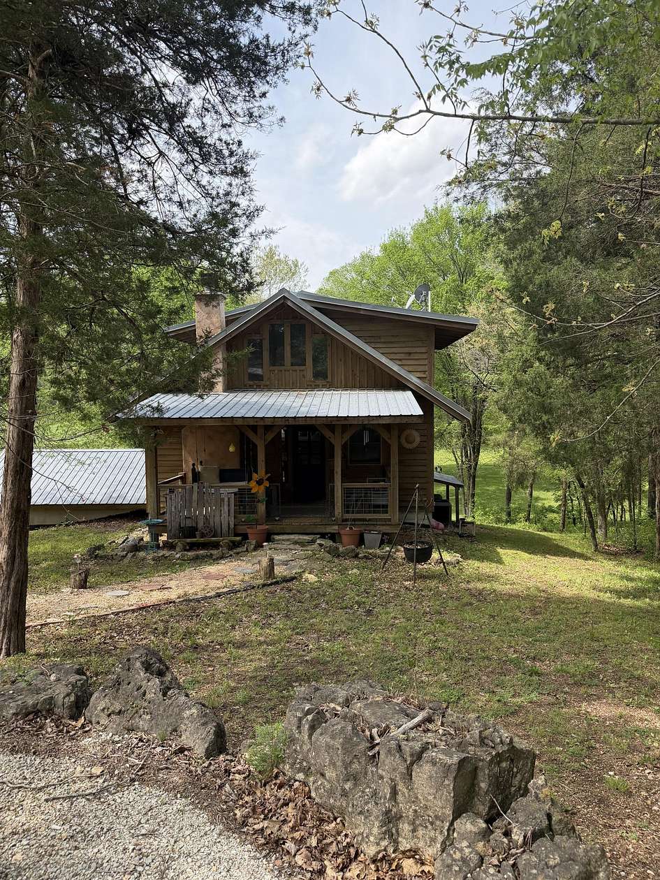 10 Acres of Land with Home for Sale in Walnut Shade, Missouri
