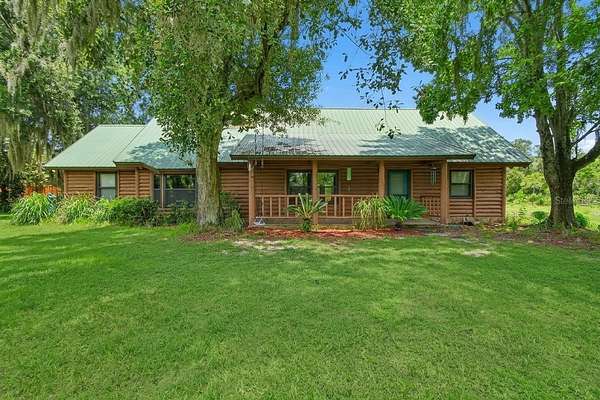 10.3 Acres of Land with Home for Sale in Osteen, Florida
