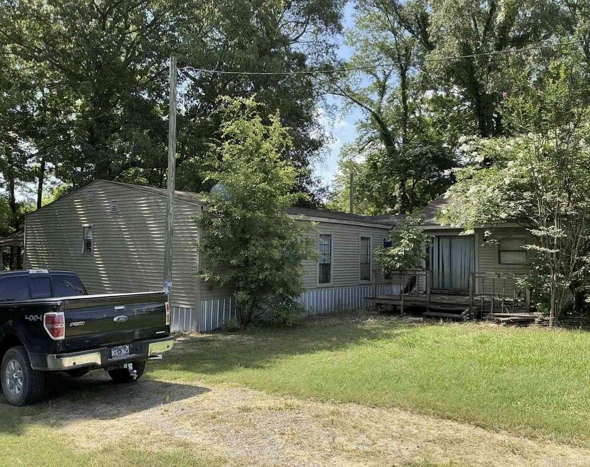 3.9 Acres of Land with Home for Auction in Humphrey, Arkansas