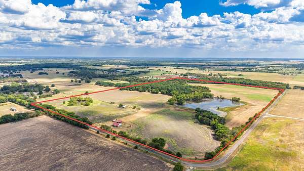 100 Acres of Land with Home for Sale in Wolfe City, Texas