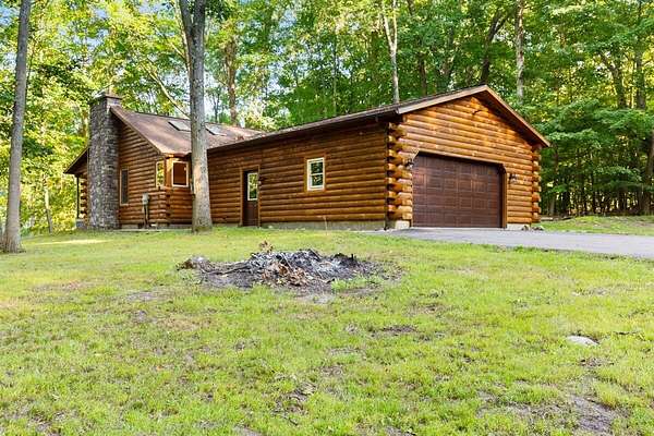 12 Acres of Land with Home for Sale in Stanton, Michigan
