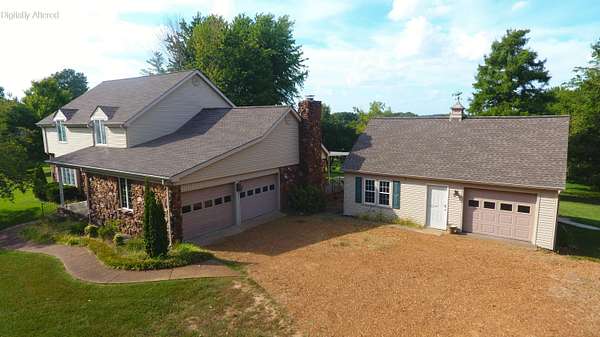 4.45 Acres of Land with Home for Auction in Paducah, Kentucky