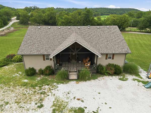 9.3 Acres of Land with Home for Sale in Wheatland, Missouri